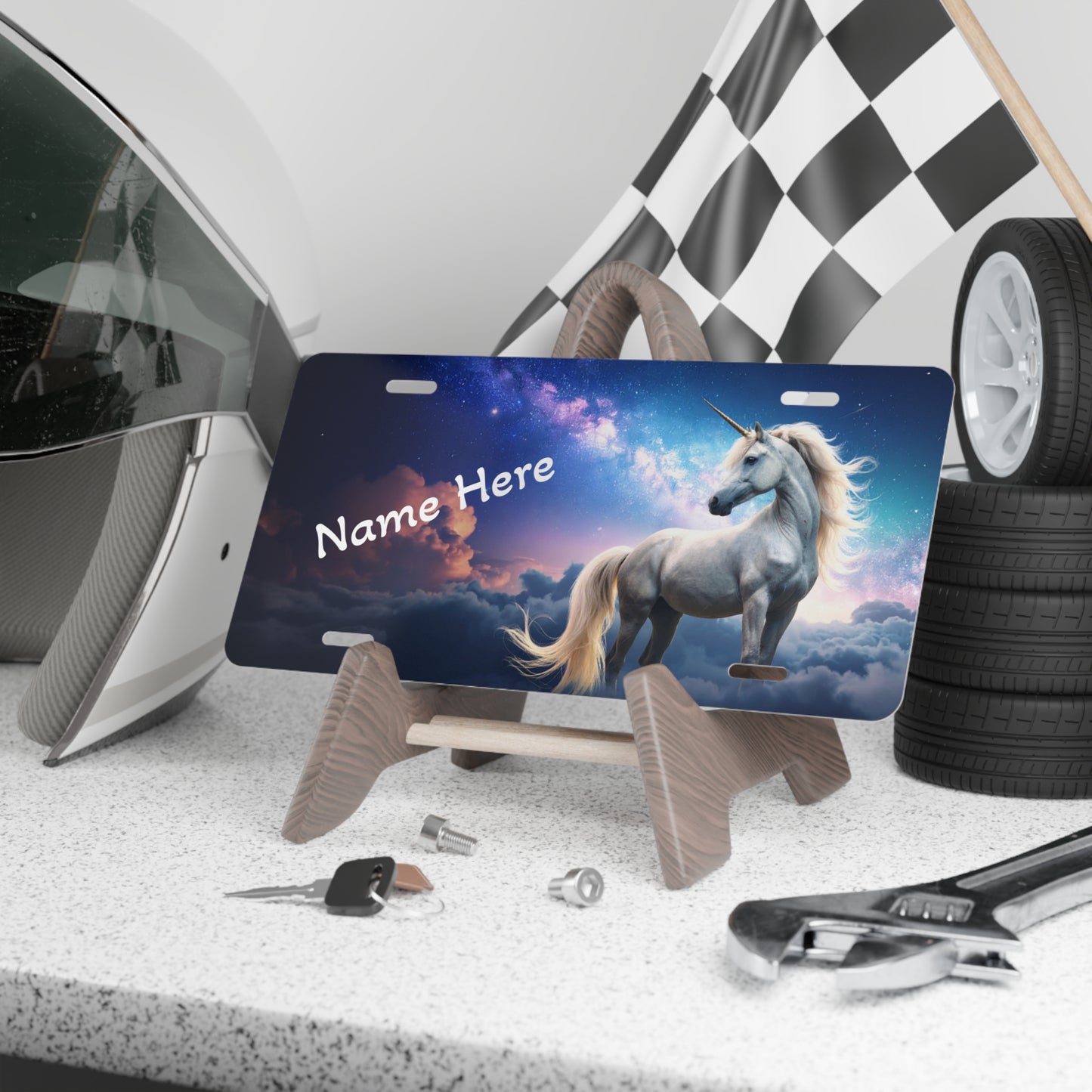 Close up of Unicorn vanity license plate with 'Name Here' text on display.