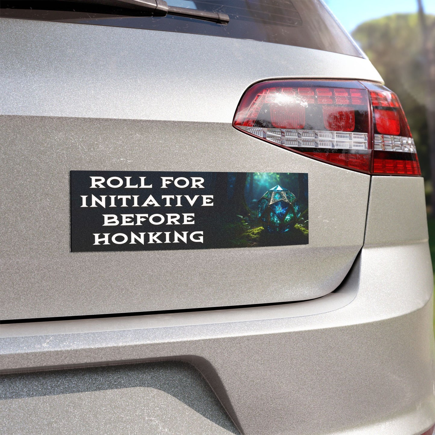 Close up of Roll for Initiative before Honking magnetic bumper sticker on display on silver car.