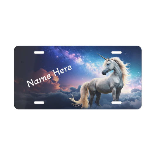 Unicorn license plate with customizable text against a colorful sky background